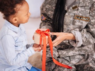 child giving gift